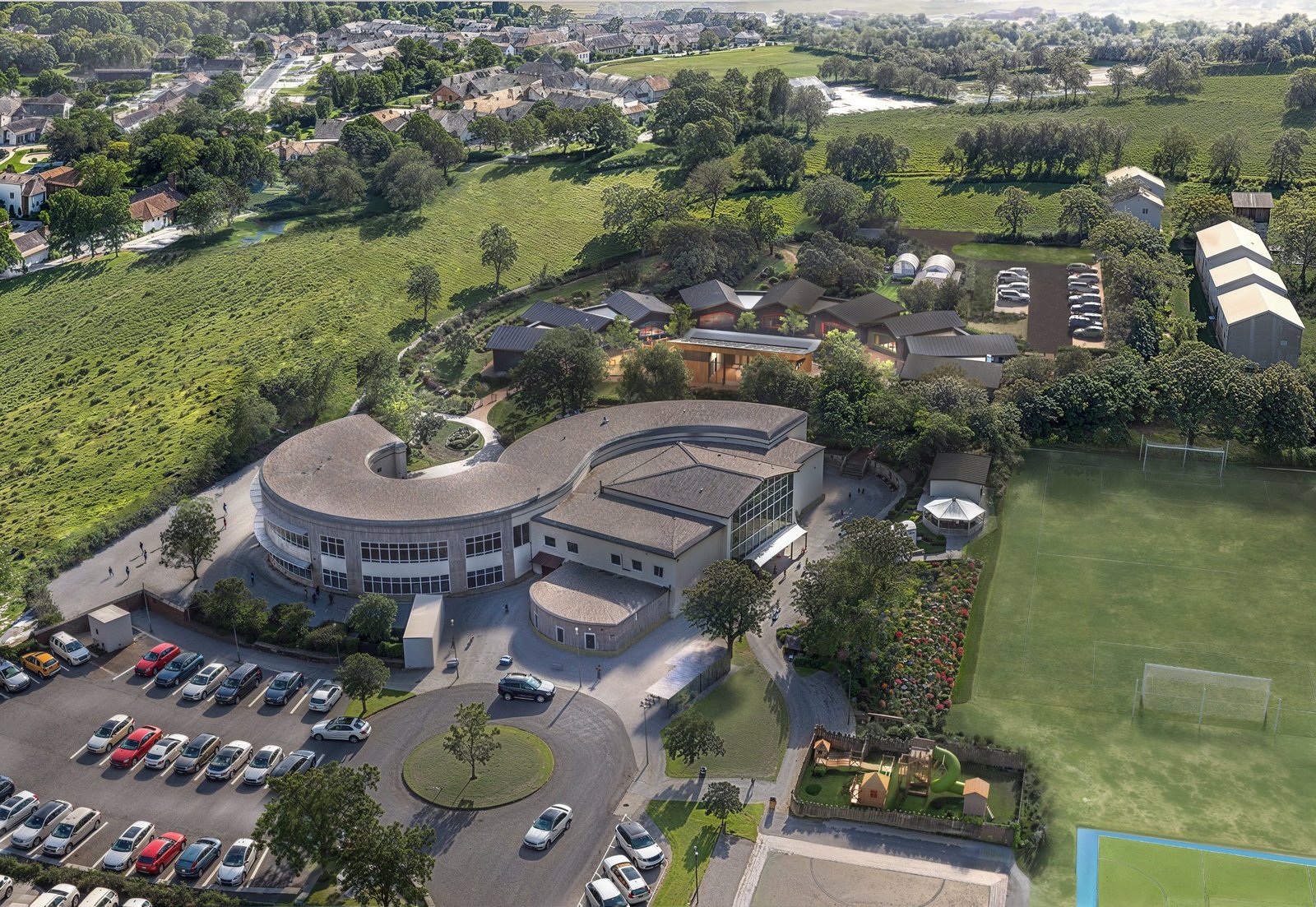 Architect's aerial view from the car park side, showing the existing curved school building with the new classroom buildings beyond it